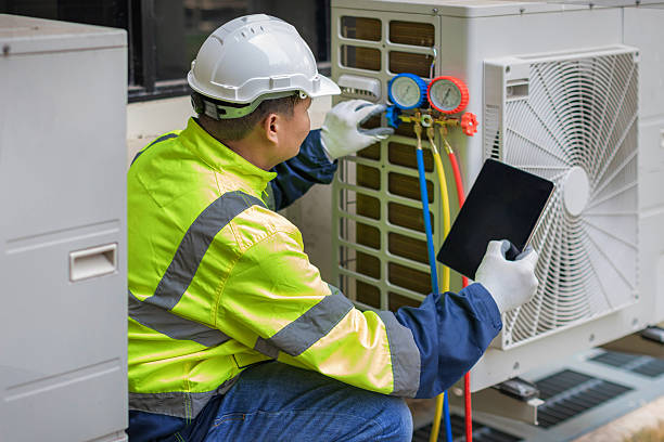 Professional Hvac technician working in Willard, OH